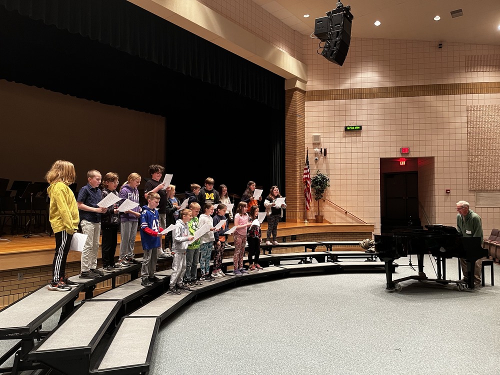 Fourth Graders performing on risers